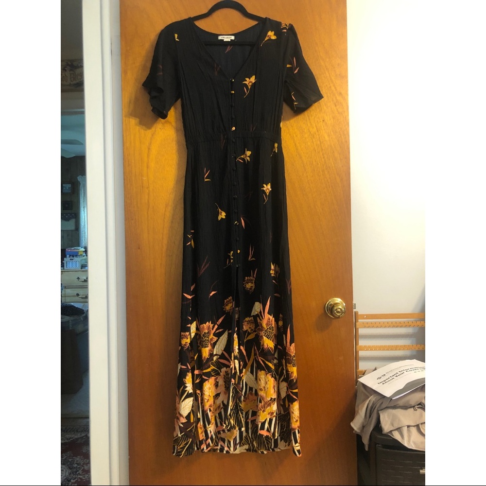 Light weight black dress with floral accents! Beautiful for any day!